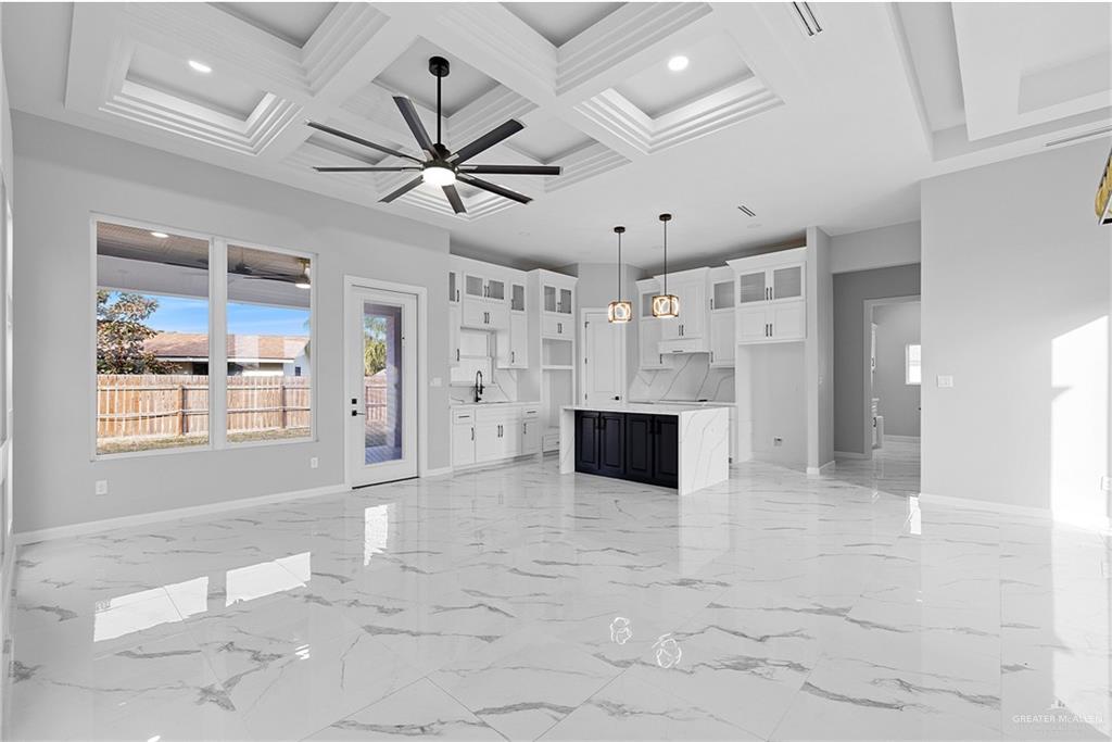 5100 Duke Avenue McAllen, TX 78504 - Photo 5 of 24 a view of an empty room with a kitchen