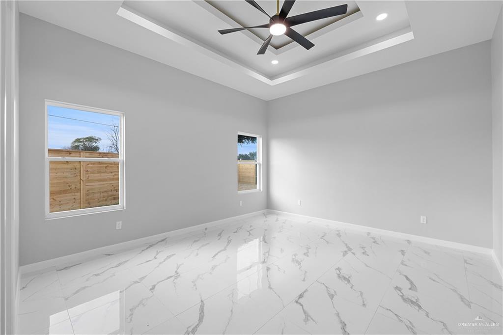5100 Duke Avenue McAllen, TX 78504 - Photo 10 of 24 an empty room with windows