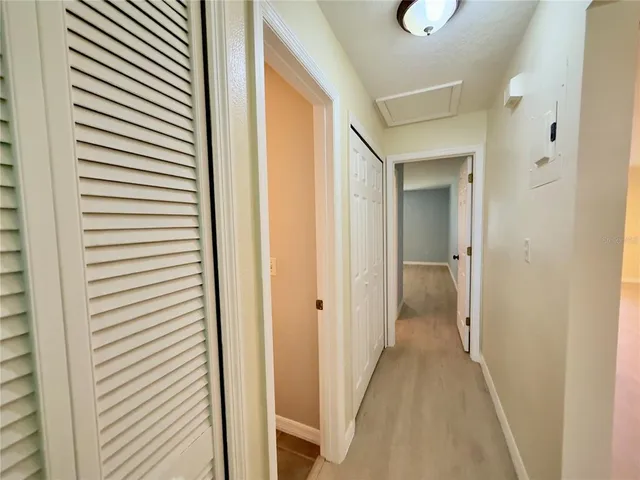 a view of a bathroom from the hallway