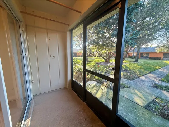 a view of a room with a large window