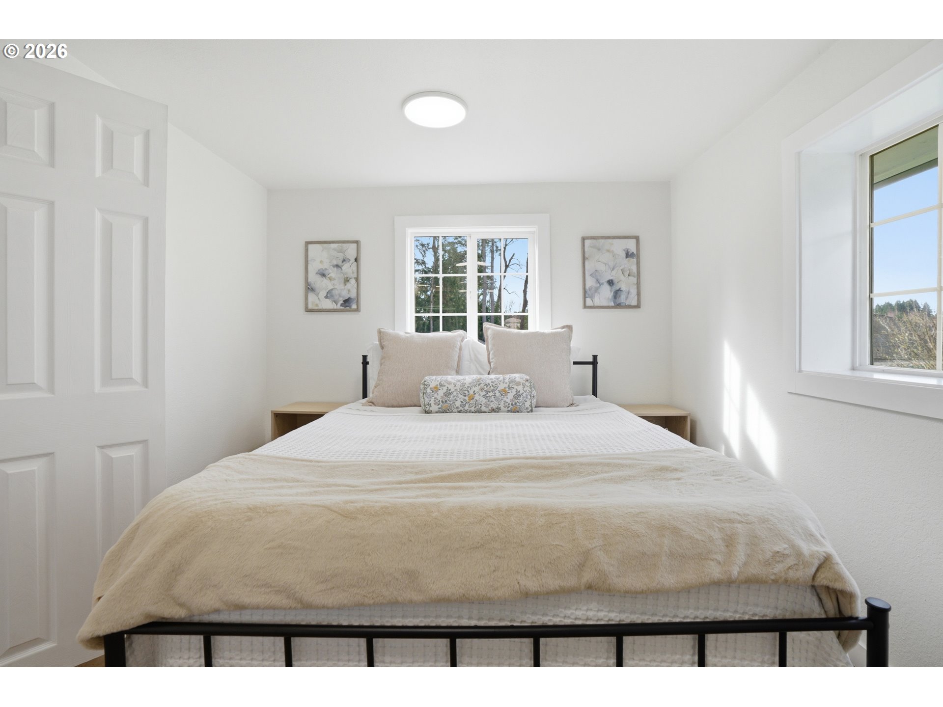 8207 Southeast Cottrell Road Gresham, OR 97080 - Photo 13 of 42 a bedroom with a bed and a window