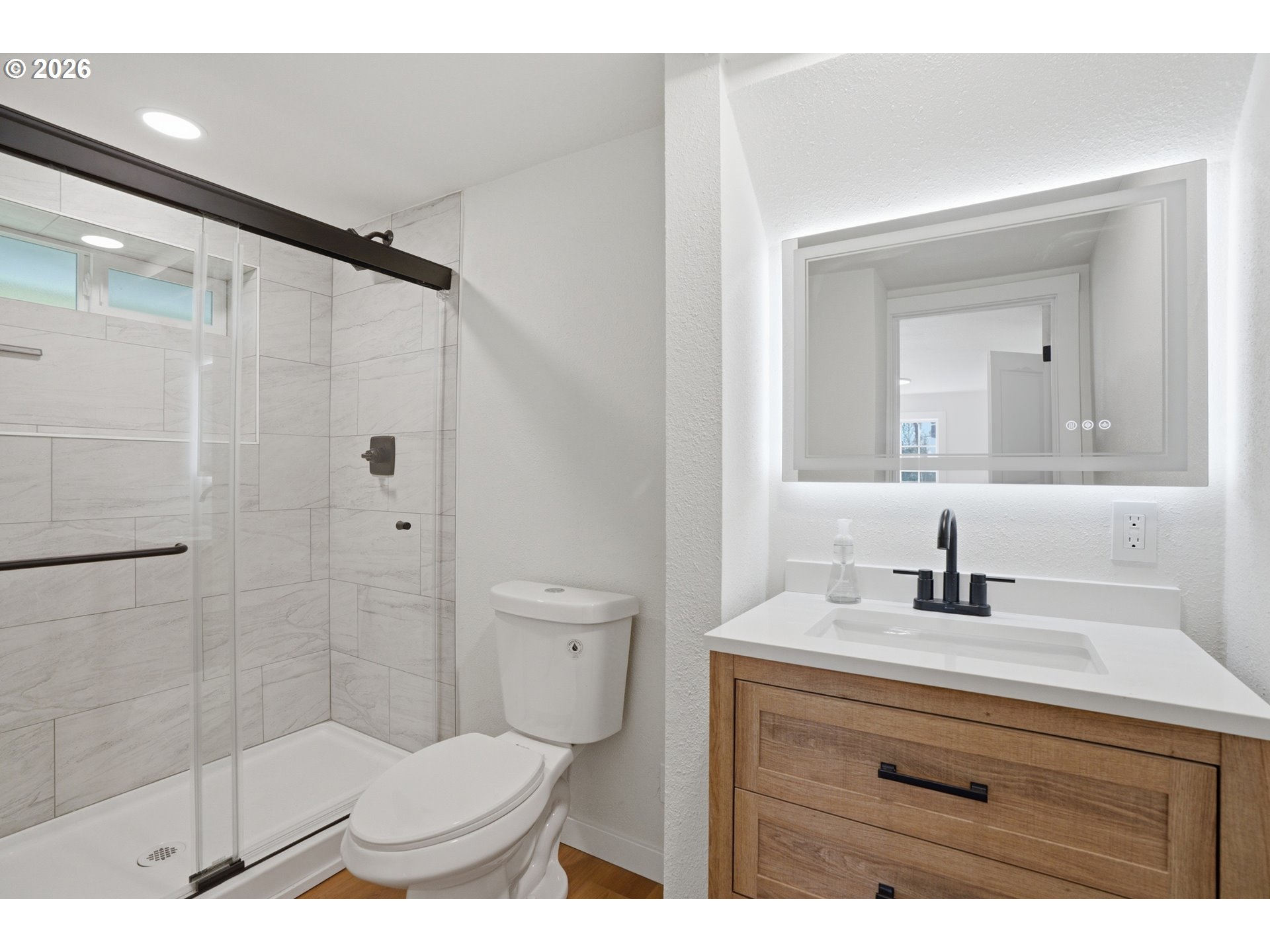8207 Southeast Cottrell Road Gresham, OR 97080 - Photo 15 of 42 a bathroom with a sink toilet and shower