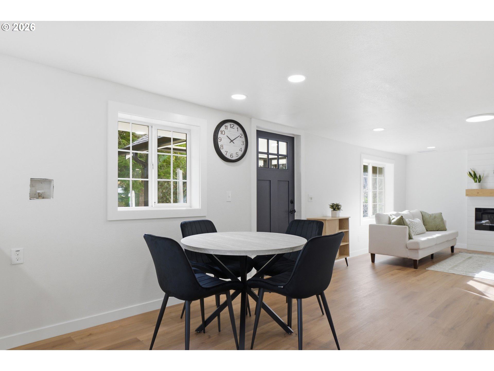 8207 Southeast Cottrell Road Gresham, OR 97080 - Photo 21 of 42 a view of a dining room with furniture and wooden floor