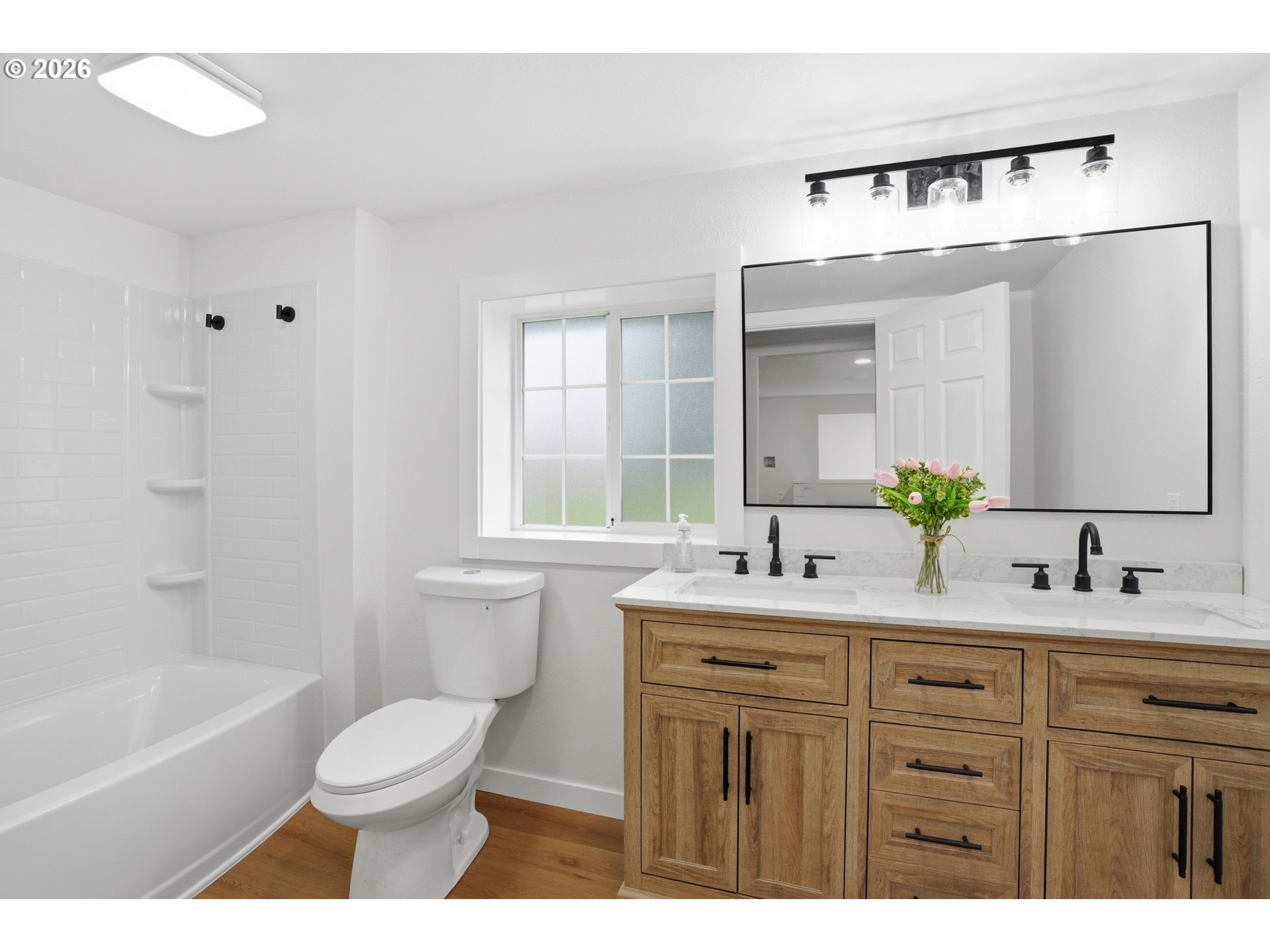 8207 Southeast Cottrell Road Gresham, OR 97080 - Photo 24 of 42 a bathroom with a sink a toilet and a bathtub