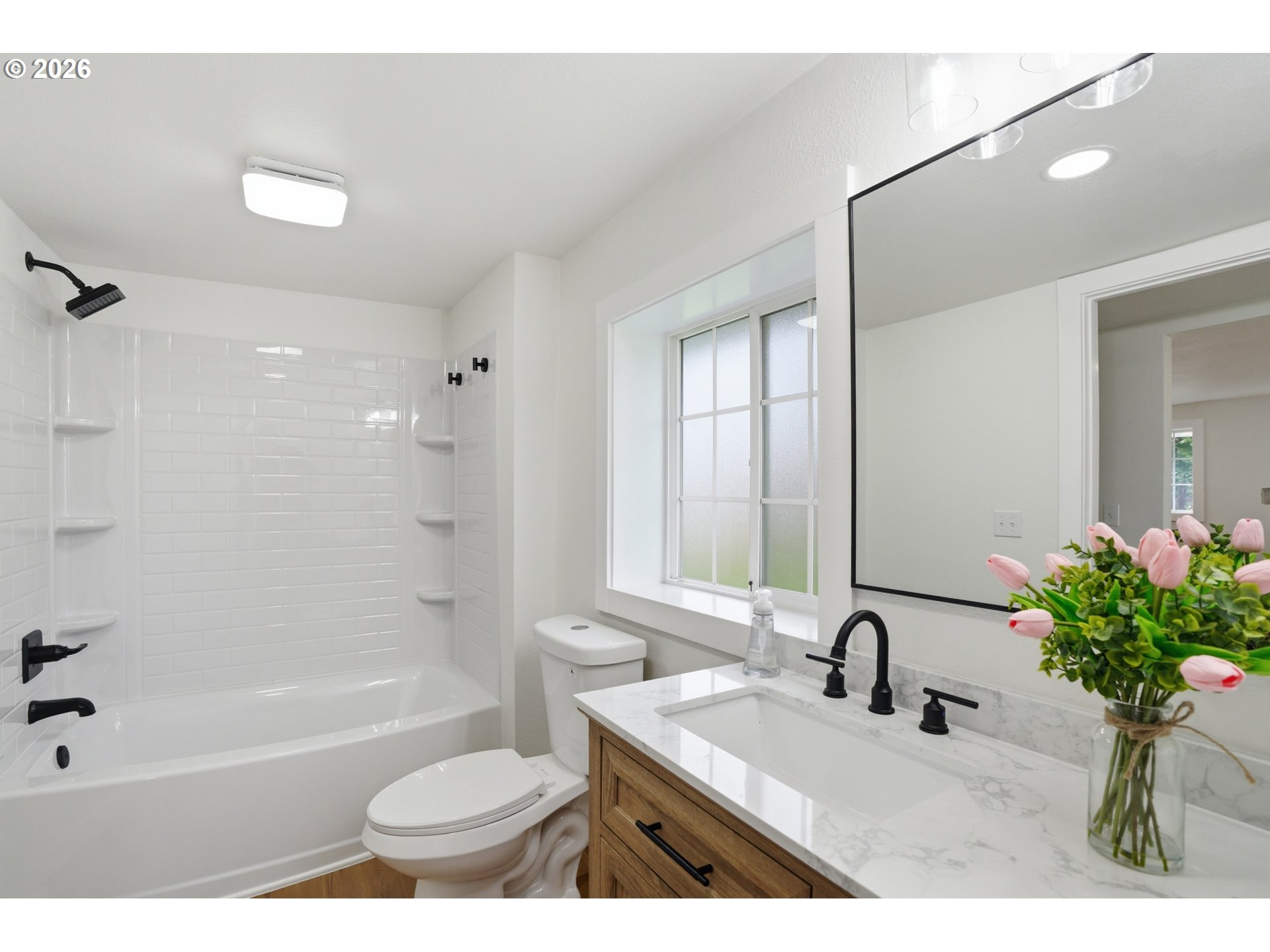 8207 Southeast Cottrell Road Gresham, OR 97080 - Photo 25 of 42 a bathroom with a sink toilet tub and shower