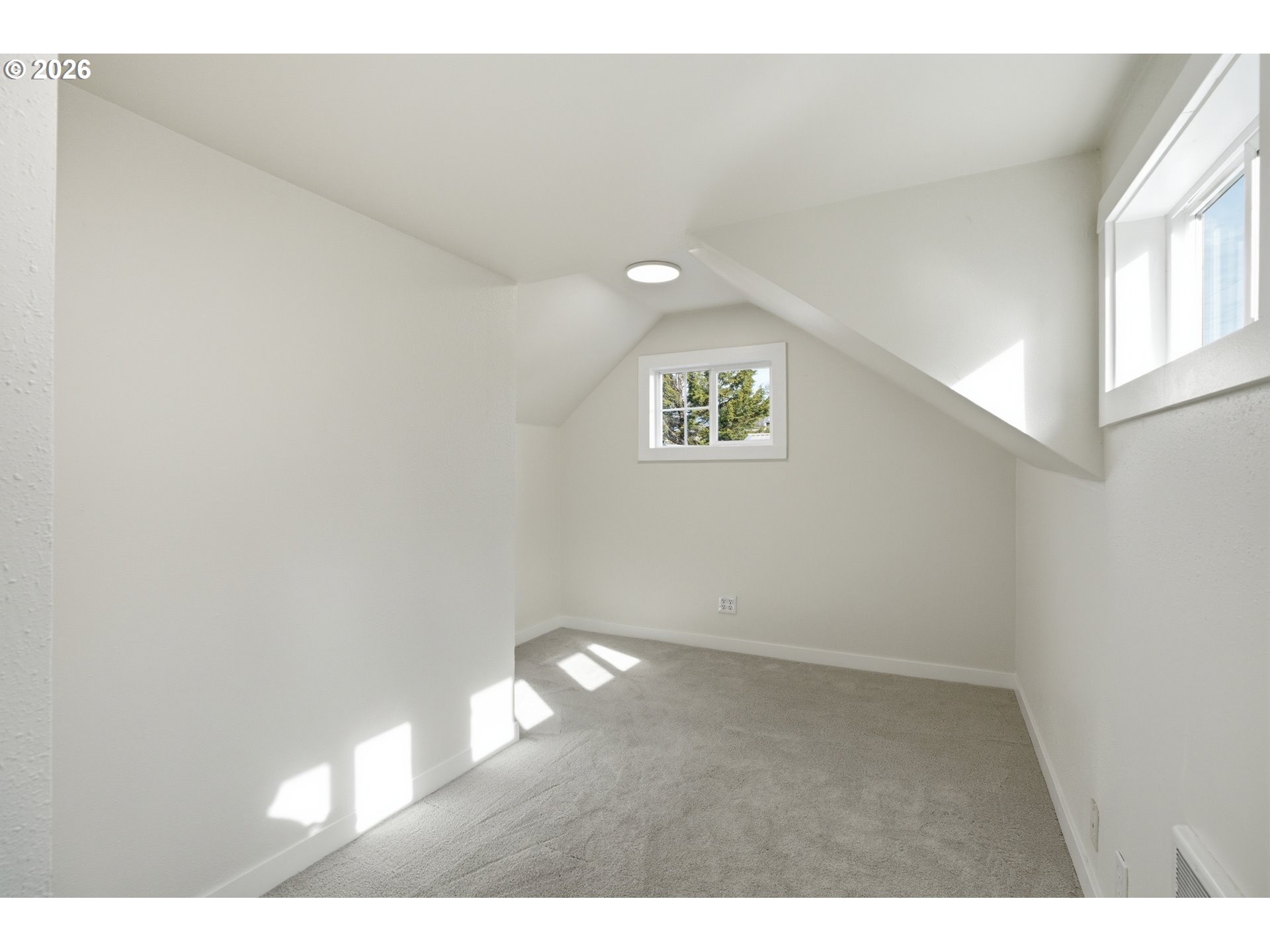8207 Southeast Cottrell Road Gresham, OR 97080 - Photo 28 of 42 a view of an empty room with a window