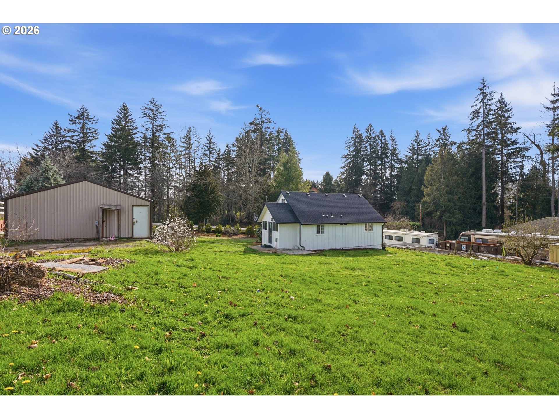 8207 Southeast Cottrell Road Gresham, OR 97080 - Photo 39 of 42 a house view with a garden space