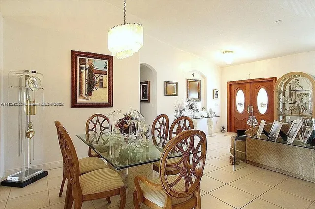 a view of a dining room and kitchen