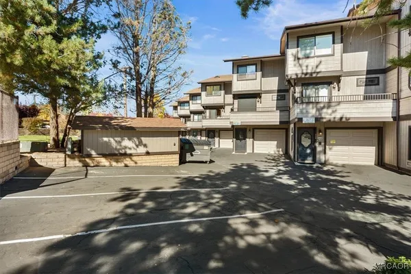 a view of a street with houses