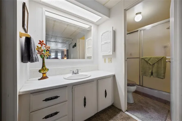 a view of a gym with seating area