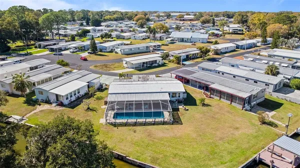 a view of a swimming pool with lounge chair