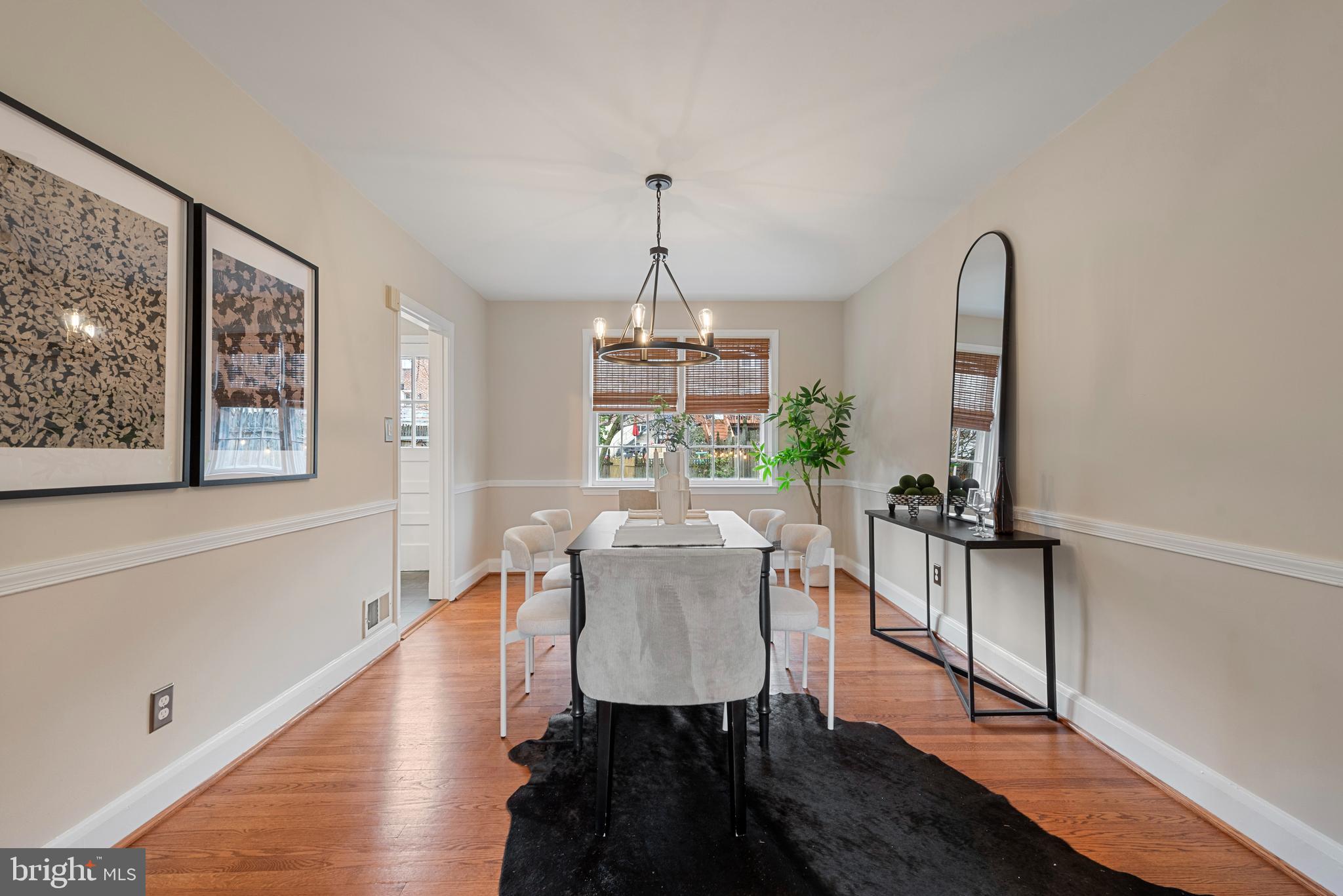 183 Stanmore Road Baltimore, MD 21212 - Photo 14 of 54 a view of a dining room with furniture window and wooden floor