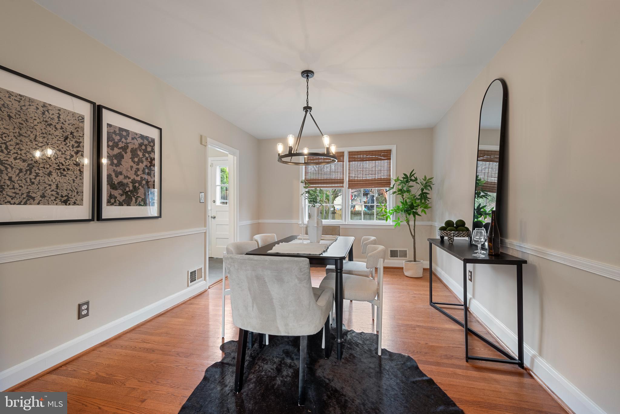 183 Stanmore Road Baltimore, MD 21212 - Photo 15 of 54 a view of a dining room with furniture window and wooden floor