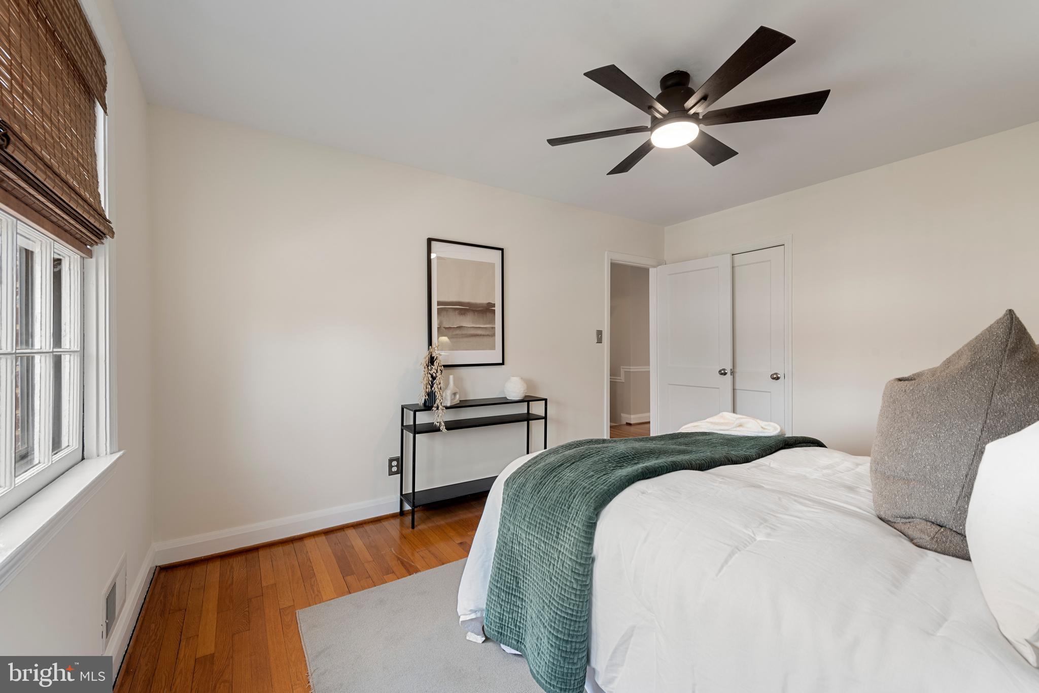 183 Stanmore Road Baltimore, MD 21212 - Photo 29 of 54 a bedroom with a bed and a ceiling fan