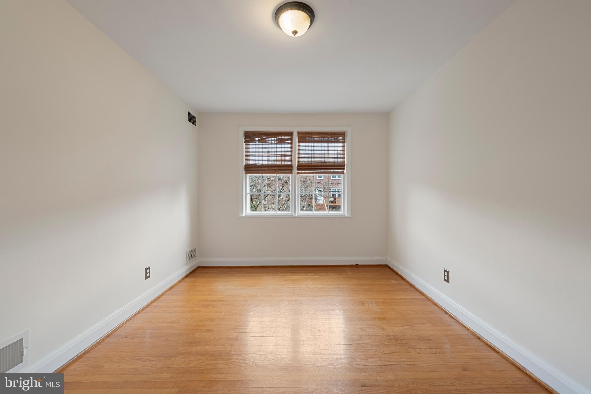 183 Stanmore Road Baltimore, MD 21212 - Photo 36 of 54 an empty room with a window