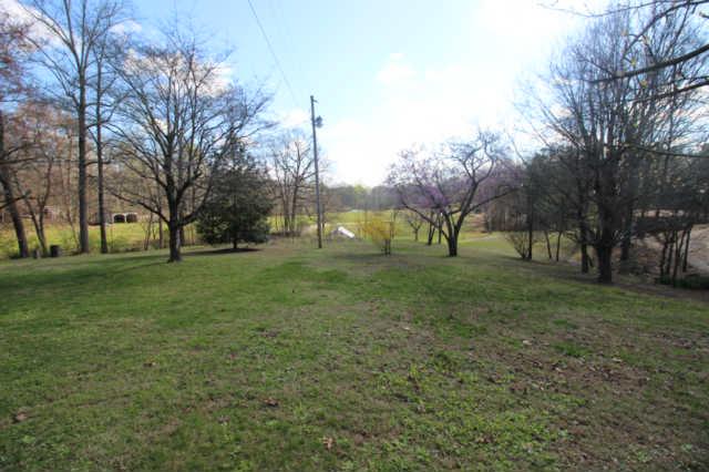 305 Black Road Dickson, TN 37055 - Photo 2 of 11 Almost 2 acres lots of flowering perinnials, rare find this close to town