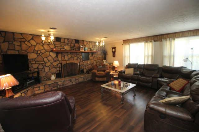 305 Black Road Dickson, TN 37055 - Photo 5 of 11 Spacious Family room with fireplace and lots of natural light. new flooring