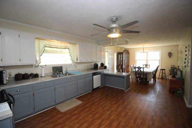 305 Black Road Dickson, TN 37055 - Photo 6 of 11 You'll love the cabinets and counter space of this great kitchen. Open to the dining area and to the covered patio