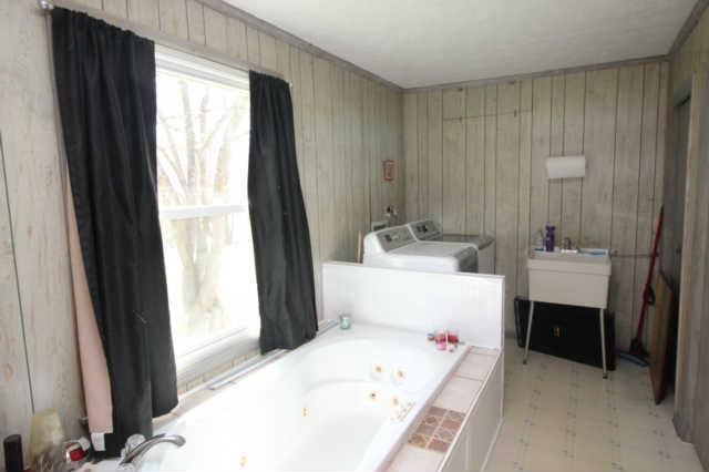305 Black Road Dickson, TN 37055 - Photo 8 of 11 Soak in the whirlpool while doing your laundry!