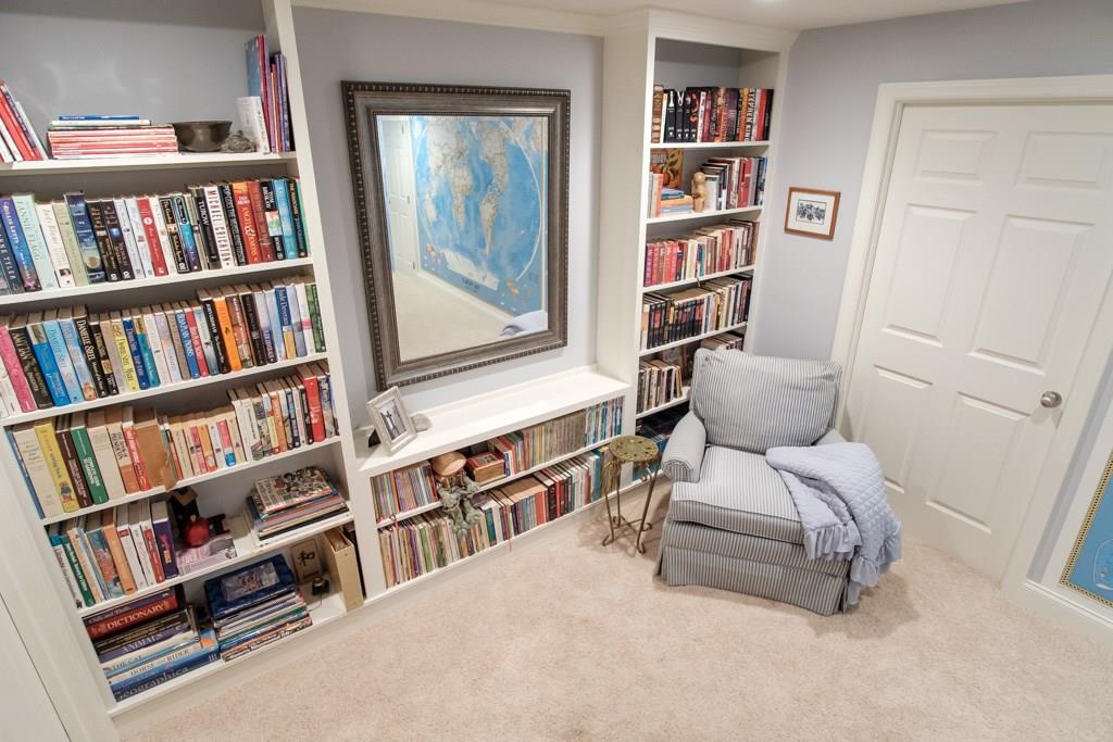 326 Buffalo Ridge Road Canonsburg, PA 15317 - Photo 20 of 25 At the bottom of the stairs leading to the lower level is a nice library/reading area