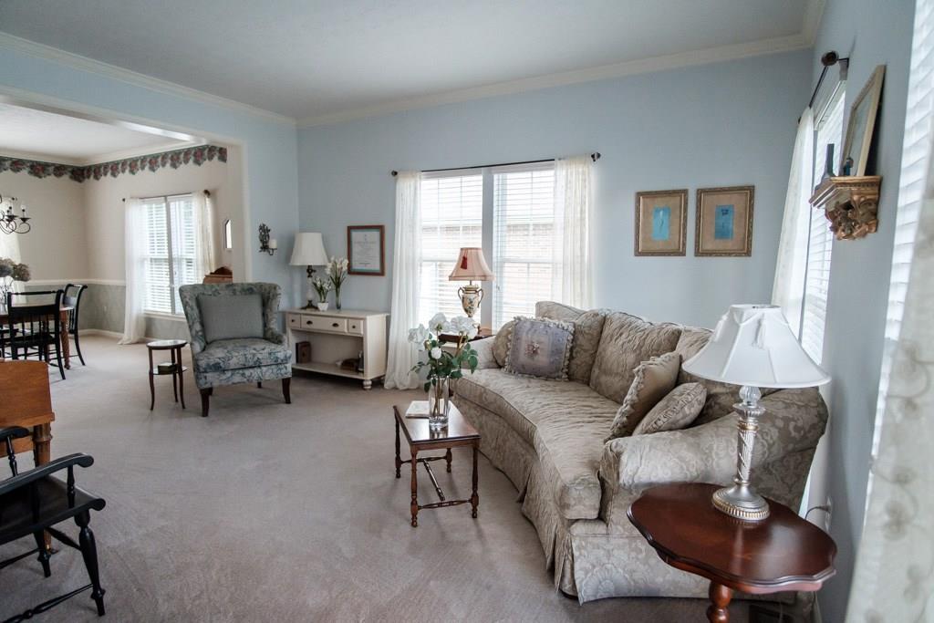 326 Buffalo Ridge Road Canonsburg, PA 15317 - Photo 3 of 25 The formal living room which opens to the dining room has tons of light and is perfect for welcoming guests