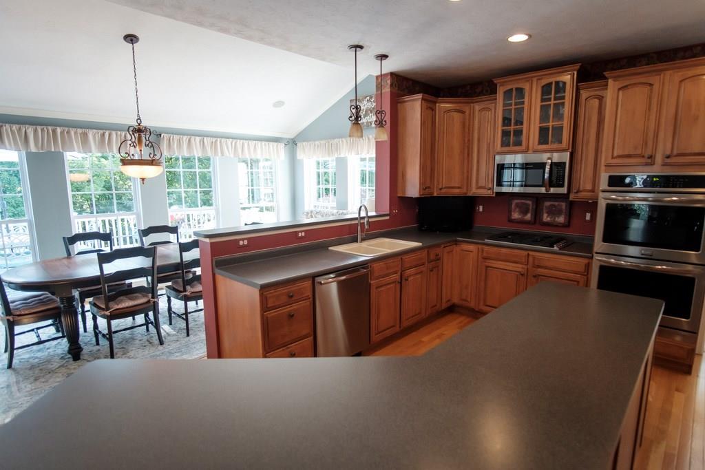 326 Buffalo Ridge Road Canonsburg, PA 15317 - Photo 5 of 25 Cabinets and counter space galore in this expansive kitchen which overlooks the sunroom.....owner added extra windows on the side to make it even more bright.