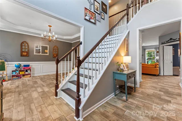 a view of entryway livingroom and hall