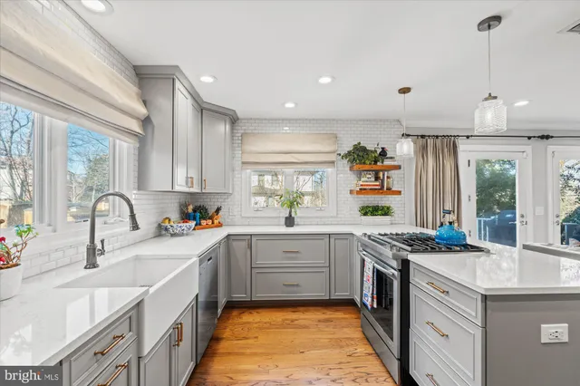 a spacious bedroom with a large bed and a dresser