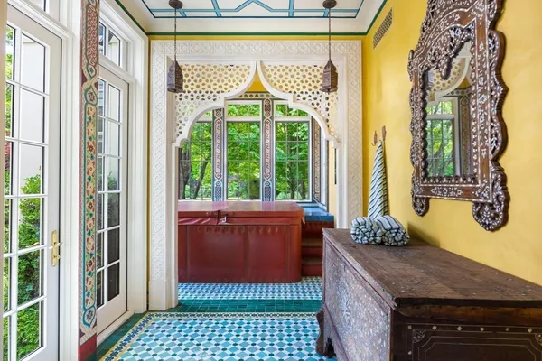 a room with a couch and a window