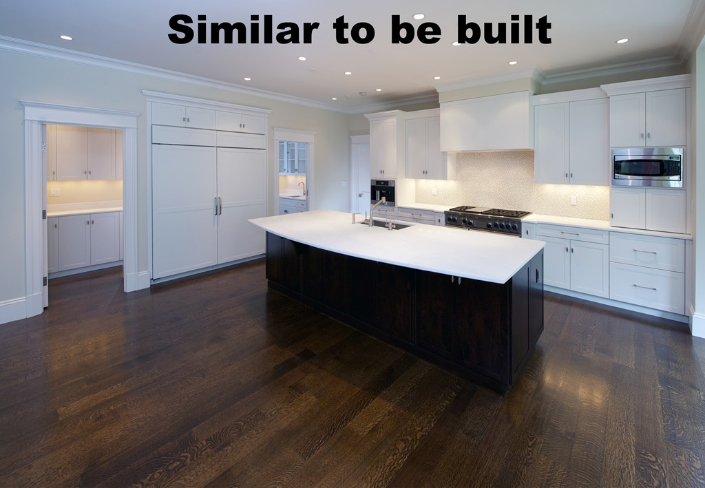 44 Falmouth Road Weston, MA 02493 - Photo 6 of 16 a kitchen with a sink stainless steel appliances and cabinets