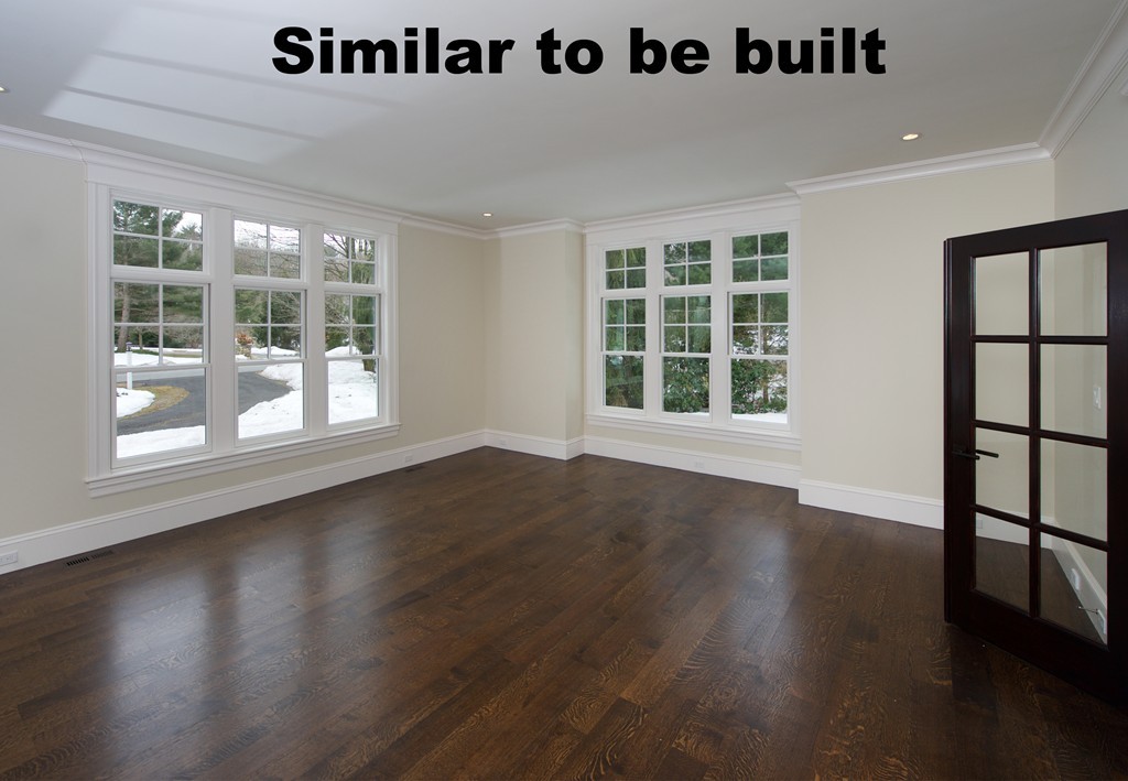 44 Falmouth Road Weston, MA 02493 - Photo 10 of 16 a view of an empty room with wooden floor and a window