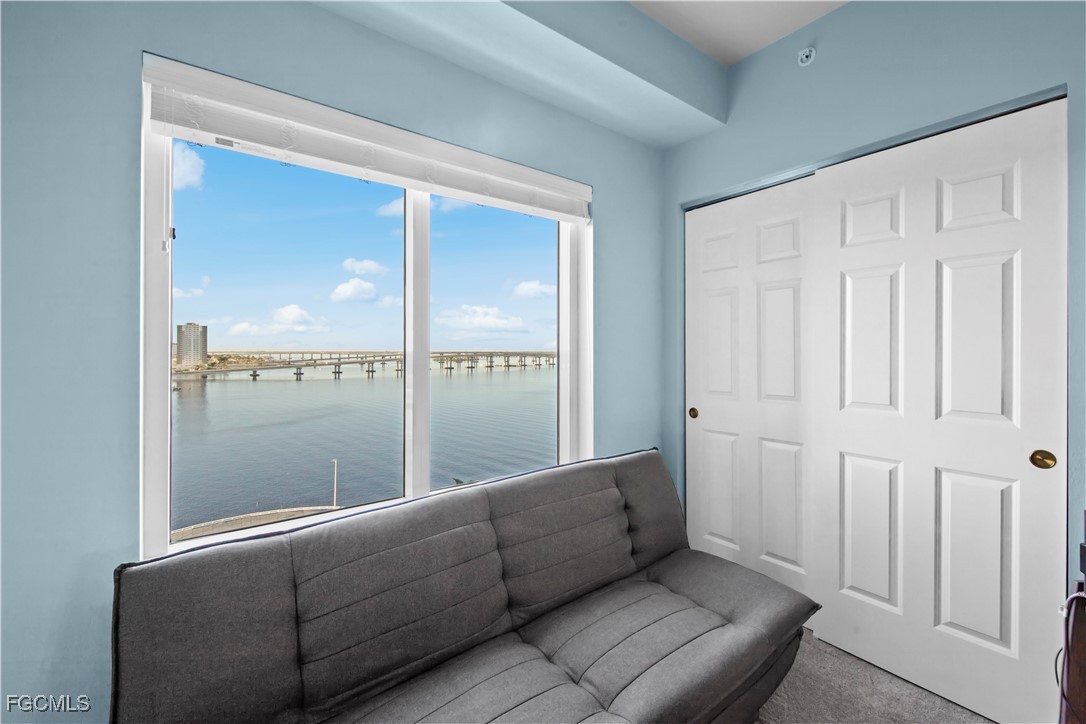 2745 First Street, Unit 801 Fort Myers, FL 33916 - Photo 29 of 50 a living room with furniture and a window