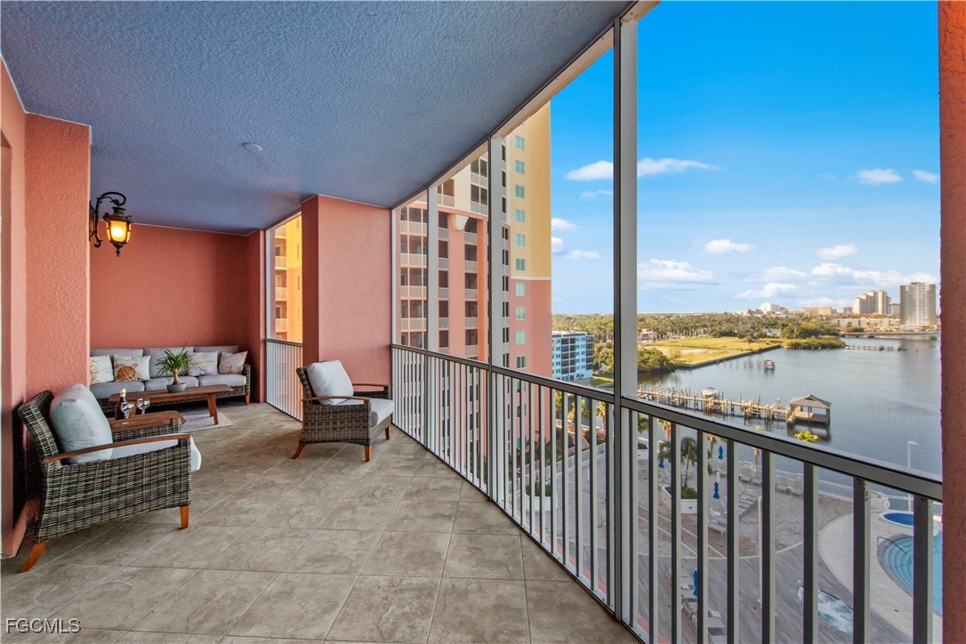 2745 First Street, Unit 801 Fort Myers, FL 33916 - Photo 41 of 50 a balcony with chairs and city view
