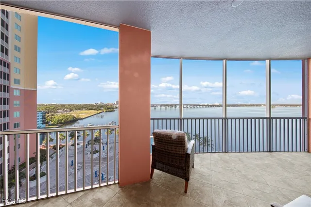 a balcony view with a ocean view