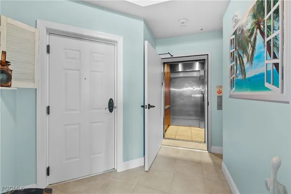 a view of elevator with hallway