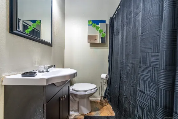 a bathroom with a sink and a toilet