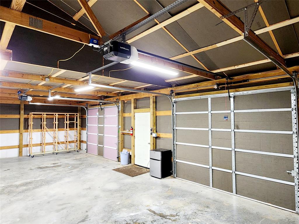 3514 Buchanan Loop Road Texarkana, TX 75501 - Photo 35 of 40 a view of an empty room with wooden floor and windows