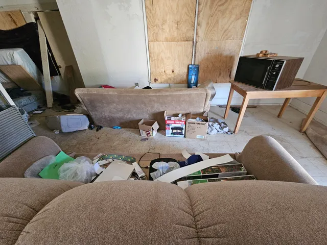 a living room with furniture and a couch