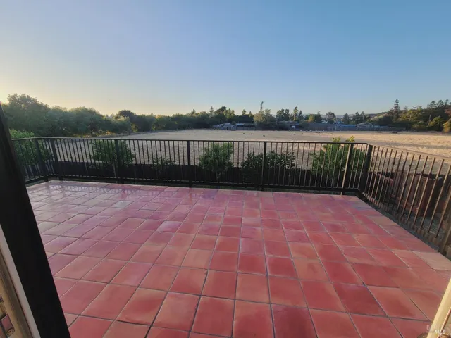 a view of balcony with hardwood