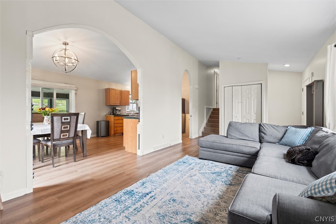 4615 Broad Road Onondaga, NY 13215 - Photo 9 of 47 13. Cozy family room with gas fireplace and built-
