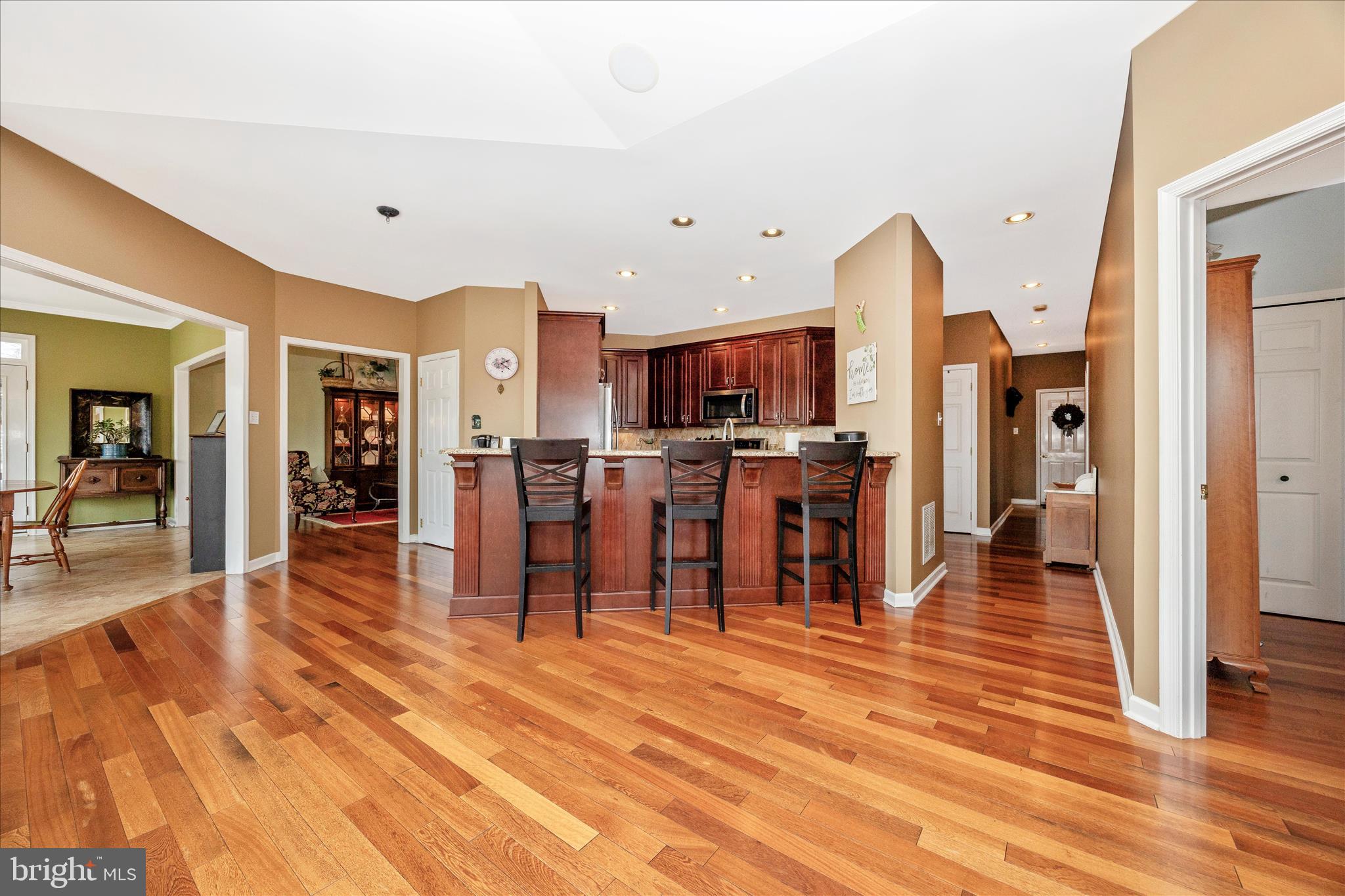 6181 Challedon Circle Mount Airy, MD 21771 - Photo 12 of 63 a view of a kitchen with furniture and wooden floor