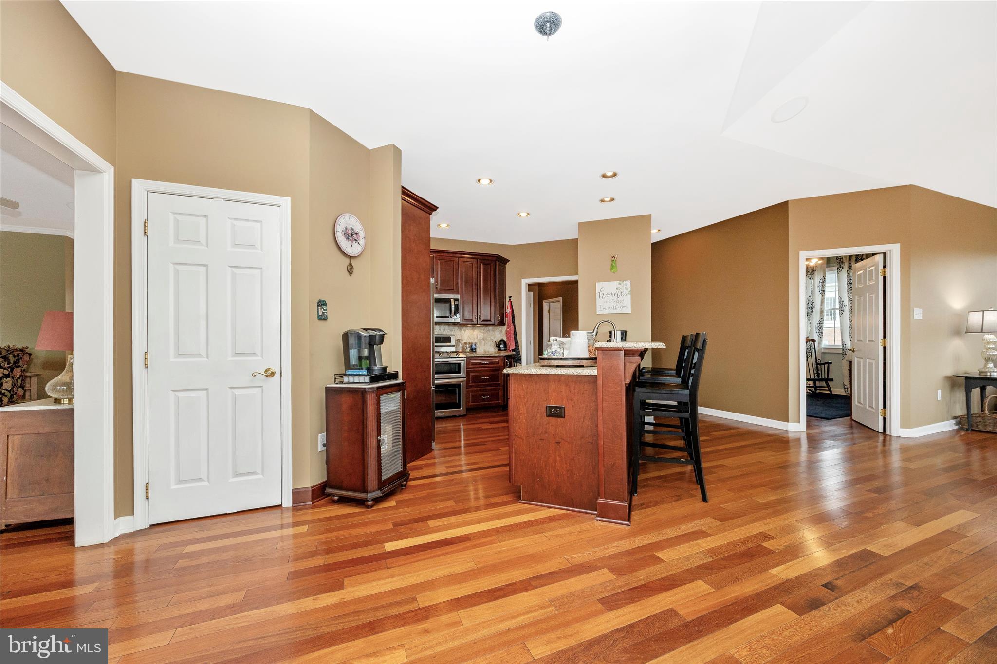 6181 Challedon Circle Mount Airy, MD 21771 - Photo 13 of 63 a view of a kitchen with furniture and wooden floor