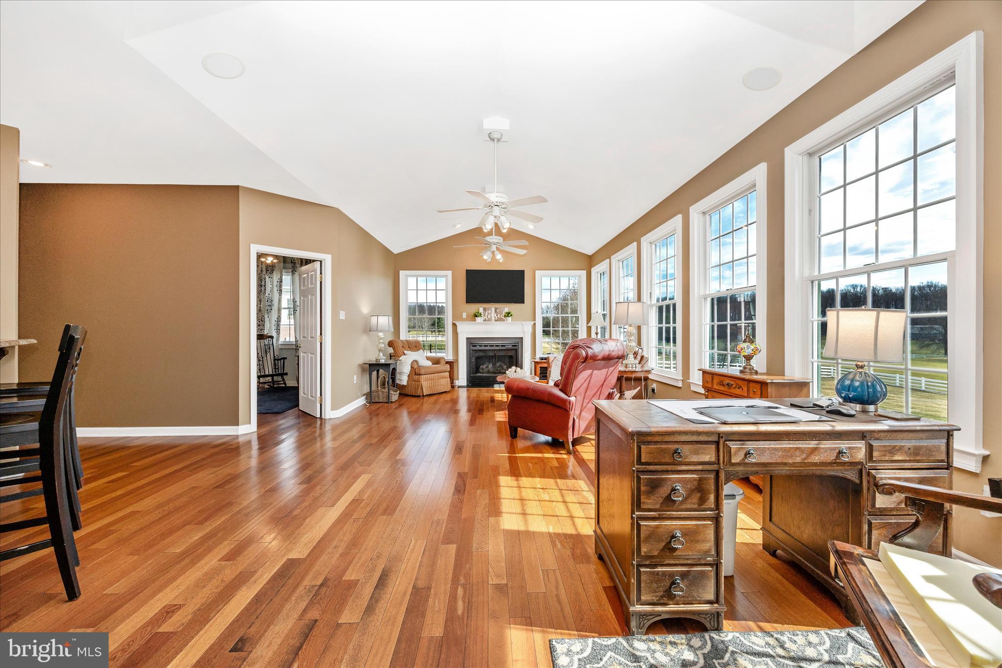 6181 Challedon Circle Mount Airy, MD 21771 - Photo 17 of 63 a living room with furniture a large window with wooden floor