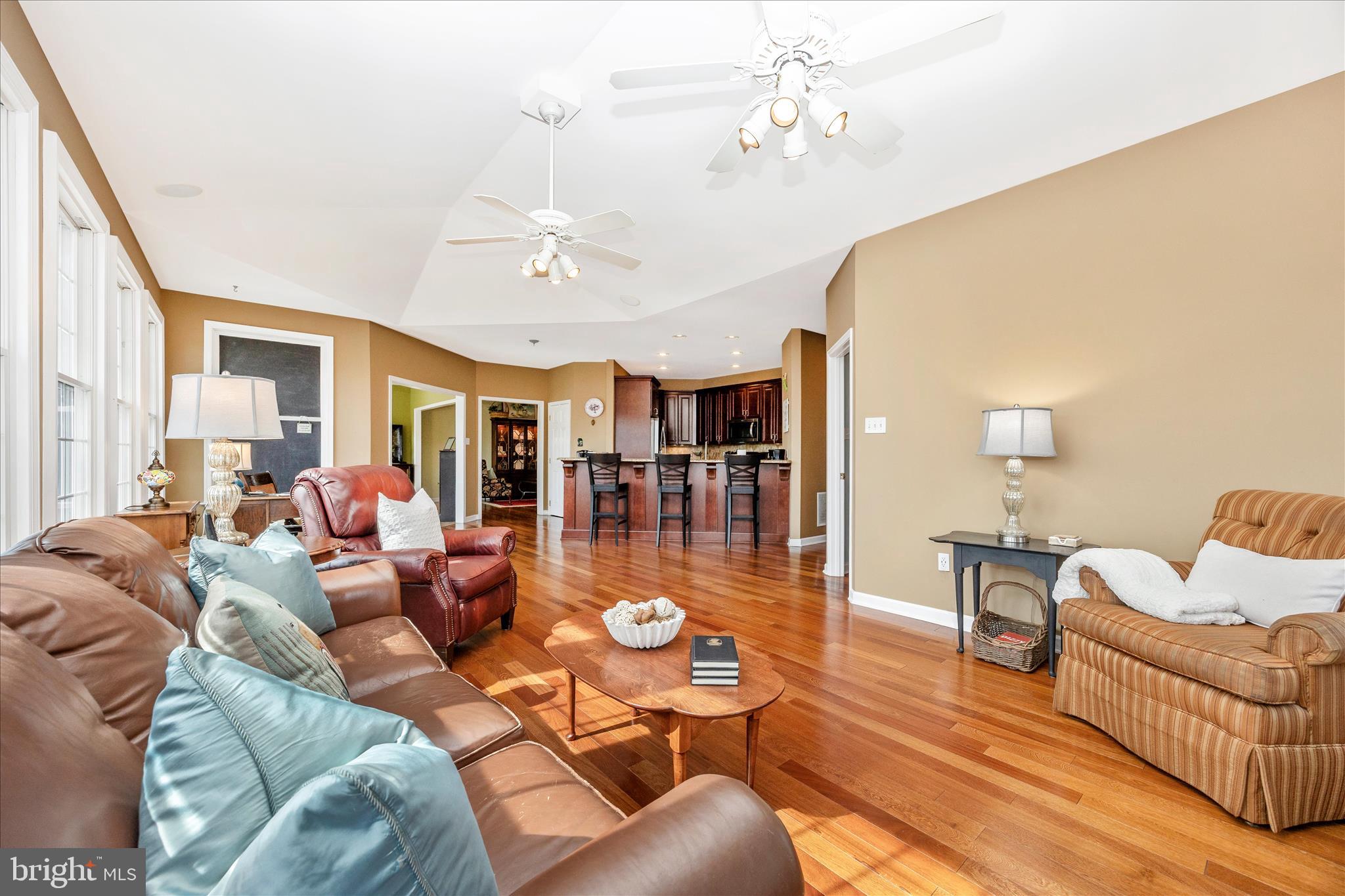 6181 Challedon Circle Mount Airy, MD 21771 - Photo 19 of 63 a living room with furniture and a chandelier