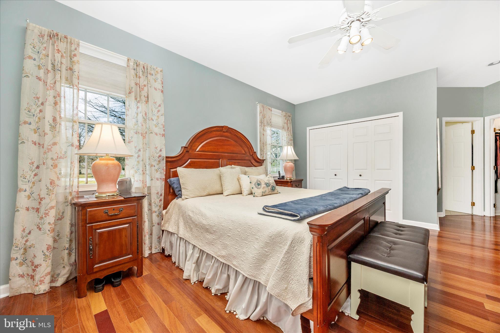 6181 Challedon Circle Mount Airy, MD 21771 - Photo 24 of 63 a bedroom with a bed and a chandelier