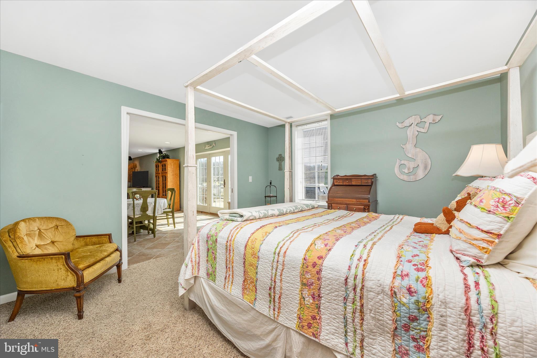 6181 Challedon Circle Mount Airy, MD 21771 - Photo 37 of 63 a bedroom with a bed a couch and dresser