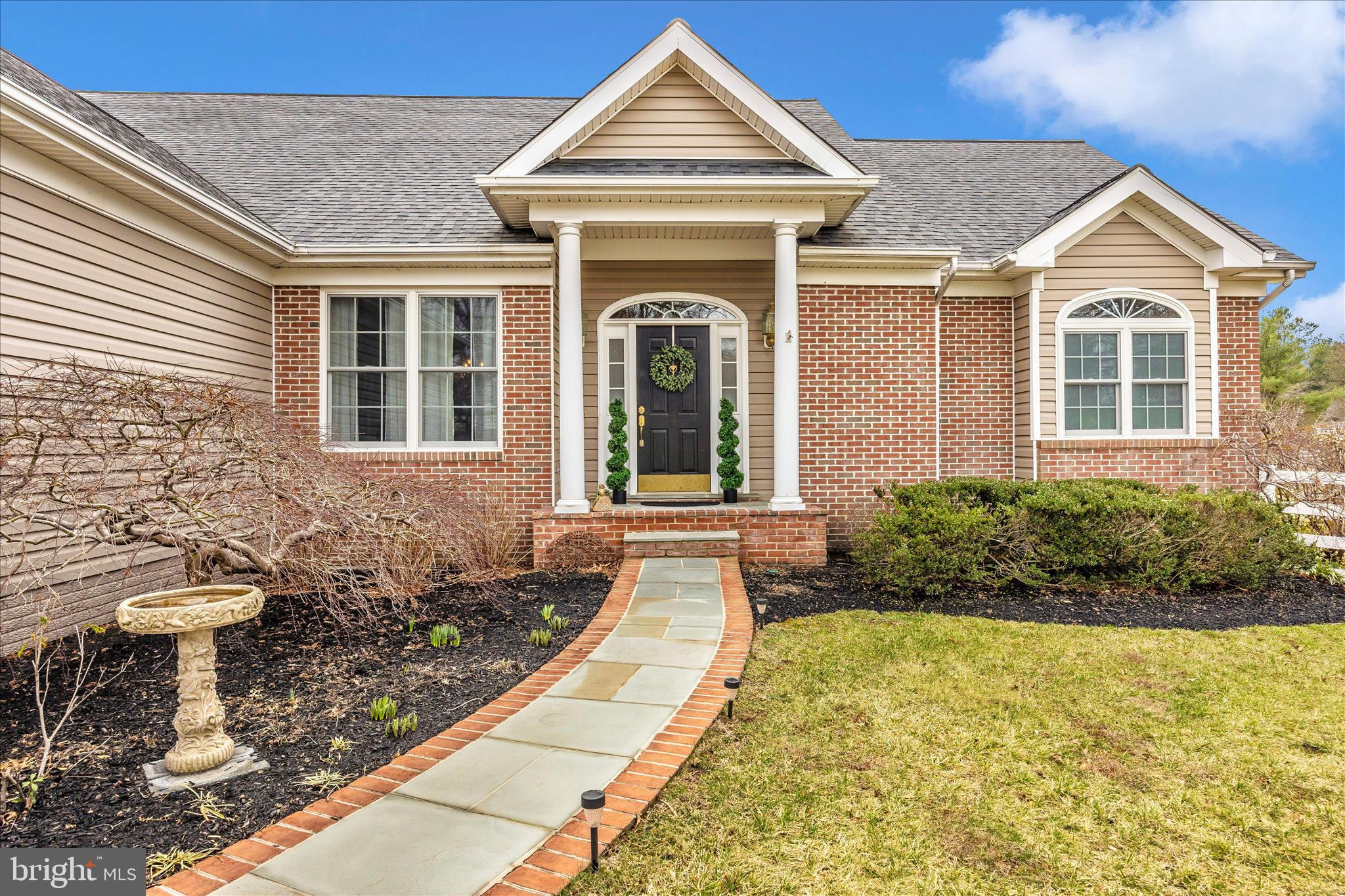 6181 Challedon Circle Mount Airy, MD 21771 - Photo 4 of 63 a front view of a house with a yard