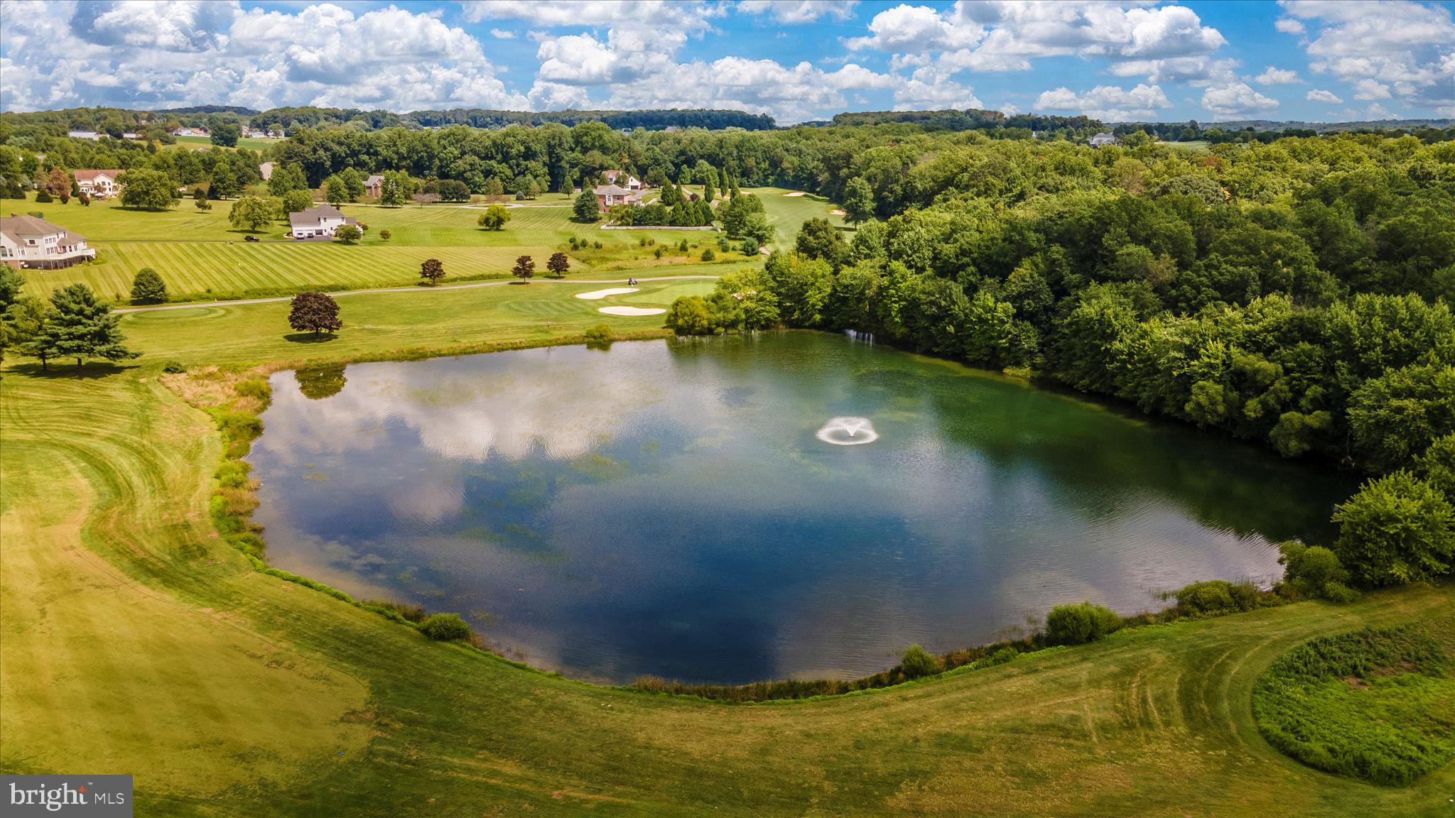 6181 Challedon Circle Mount Airy, MD 21771 - Photo 53 of 63 a view of a lake with a yard