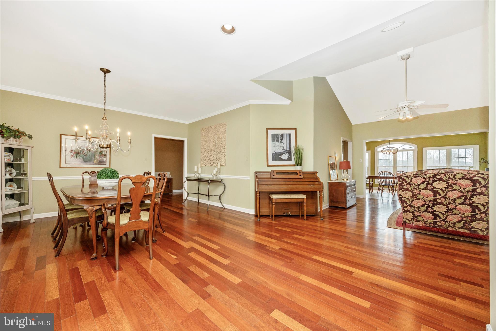 6181 Challedon Circle Mount Airy, MD 21771 - Photo 6 of 63 a dining room with furniture a chandelier and wooden floor