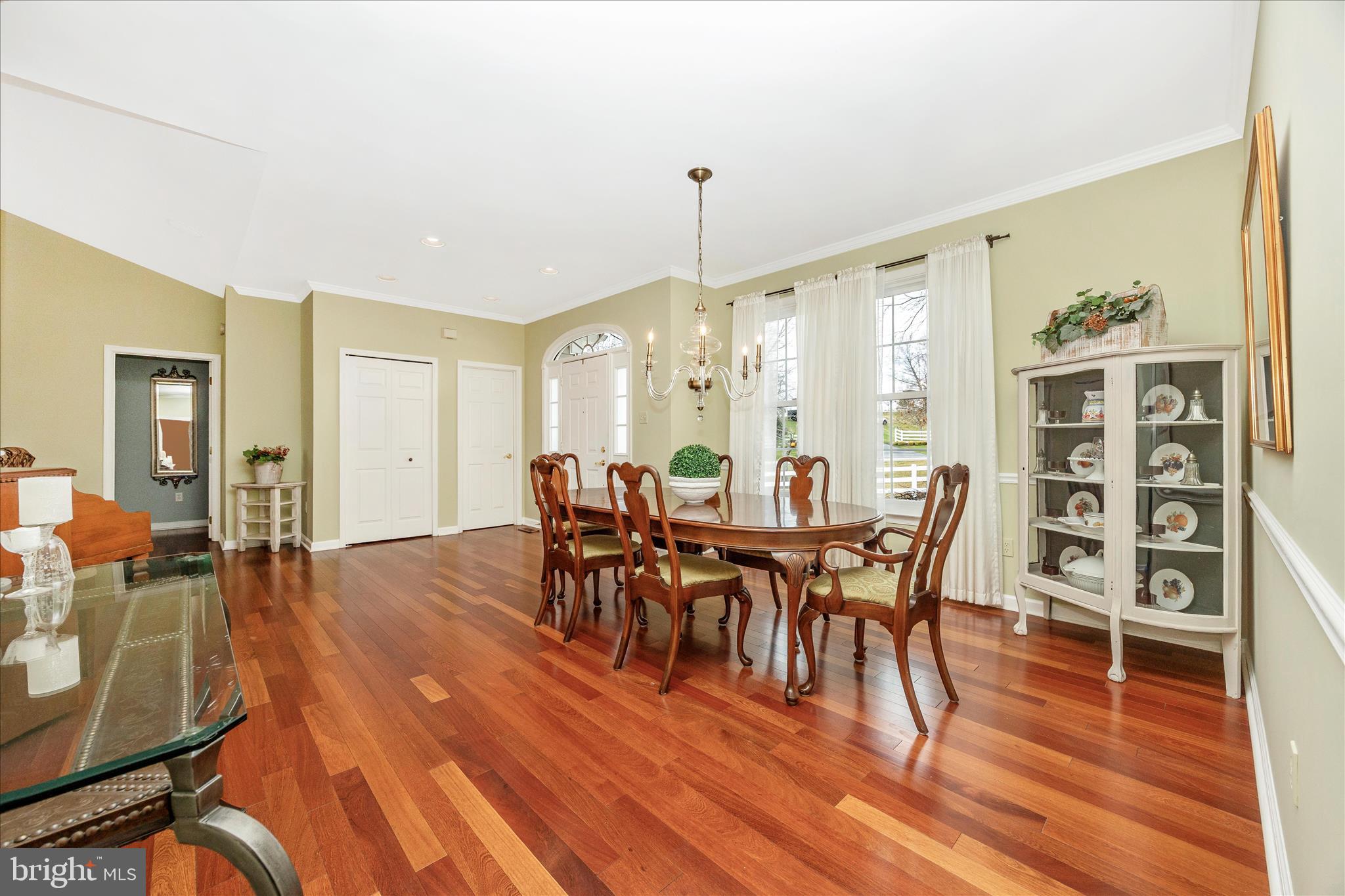 6181 Challedon Circle Mount Airy, MD 21771 - Photo 9 of 63 a view of a dining room with furniture and wooden floor